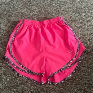 Bright pink shorts worn one time. Coming from a smoke free home